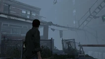 6633122203 98dd2b3d54 z.jpg (180 KB) Murphy Pendleton facing a residential home enshrouded in fog and heavy rain.