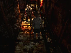 Heather encounters a Scraper in chapel's corridor.