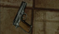 The handgun on the store floor in Silent Hill 3.