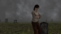 Angela in the foggy graveyard.