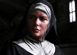 The Nun looking at Murphy.