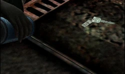 Heather obtaining the life insurance key.