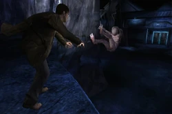 Harry tossing a Raw Shock off a ledge.