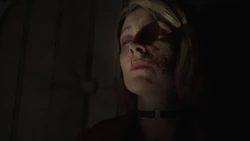 Maria's dead body in the labyrinth.