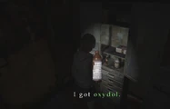 Heather picks up a bottle of Oxydol.