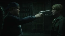 Eddie pointing his revolver at James.