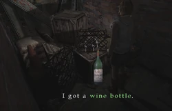 Heather picks up the wine bottle.