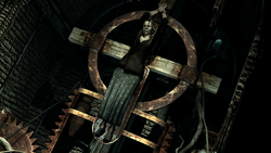 Lillian suffering on the torture device.