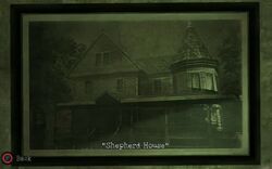 The house as seen in the library of Centennial Building.