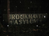 The asylum's sign.