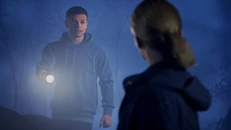 Nils and Astrid in the woods.