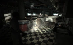 Murphy wielding the flashlight.