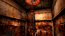 Heather finds a corpse hanging upside down from the ceiling.