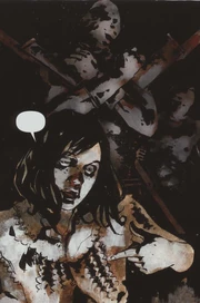 Christabella stands with a pair of  behind her.