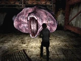 Silenthill3worm.jpg (204 KB) Heather facing the Split Worm.