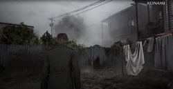 James follows the silhouette through the backyards.