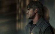 Murphy waiting in the prison elevator.