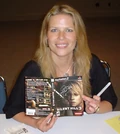 McGlynn3.png (128 KB) Mary signing a fan's copy of Silent Hill 3.