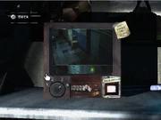 El monitor con el que el jugador abre la puerta.