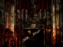 Валтиэль вращает клапан под двумя висящими парами ног, символизирующими Алессу и Шерил