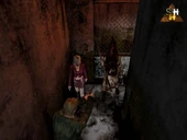 James, María y Pyramid Head en la zona desconocida del hospital.