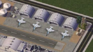 4 Jet fighters near hangars at Area 5.1