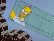 Homer opens the ice cream freezer and sees Triple Chocalate" ice cream