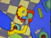 A green box of Krusty Flakes