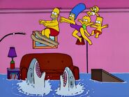 Skis couch gag