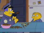 Wiggum with Ralph, his official debut as Ralph's father in I Love Lisa