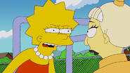 Lisa yells at Lady Gaga quietly.