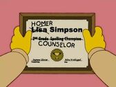 Lisa's diploma. Homer made several changes, to make it look like diploma belongs to him.