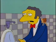 A piece of Moe's blazer is white