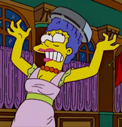 Marge is attacked by a Vac-U-Bot