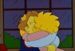 Lisa and Hugh kiss