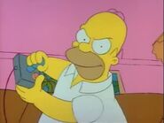 Homer playing video games