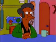 Apu at the Simpsons' table