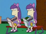 The twins are reading some magazines of Patty and Selma who are evidently twins.