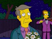 Skinner with flowers for Edna