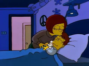 Homer sleeps while his mother sadly kisses him a goodnight and goodbye before she leaves.