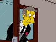 Skinner in a black suit