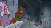 Smithers (as Robin Hood) and Marge (as Maid Marian) keeping quiet as they sneak around the castle.