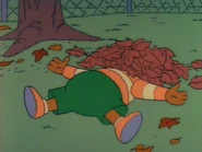 Lewis pretending to be Skinner's dead body.