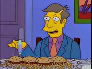 Skinner serves "steamed hams" (hamburgers)