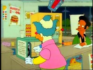 At the Kwik-E-Mart, a man who appears to be Krusty opens a microwave...