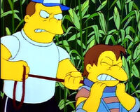 Nelson and his dad before the physical deformation.