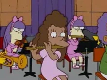 Janey tocando Flauta