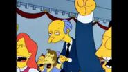 Everyone cheers after Mr. Burns' small speech.