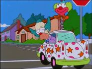 Krusty in a small clown car