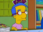 Milhouse helps run the comic book shop